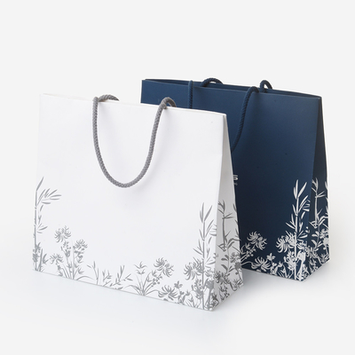 Harga yang bagus Custom Matt Glossy Laminated White Art Paper Gift Bag Dengan Genggam Untuk Belanja on line